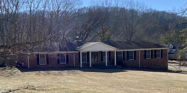 ranch-style home with brick siding