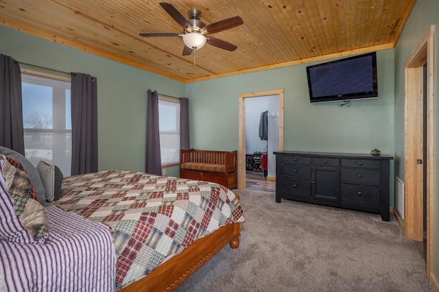 bedroom with ceiling fan, wooden ceiling, visible vents, and light colored carpet