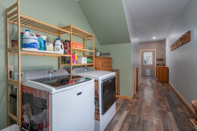 laundry area with laundry area, independent washer and dryer, dark wood finished floors, and baseboards