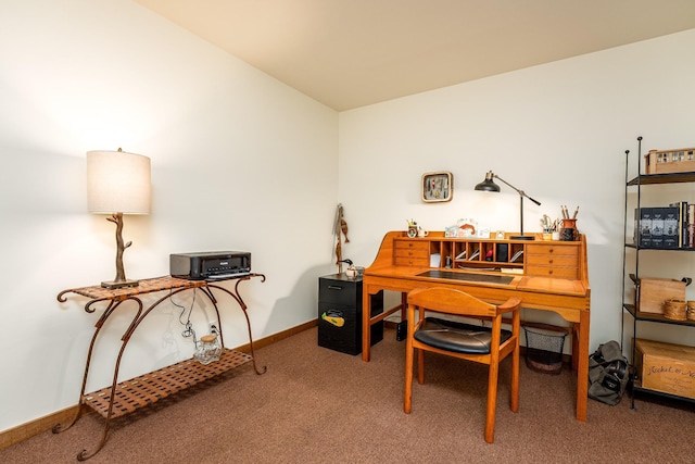 home office with carpet floors and baseboards