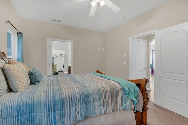 bedroom featuring carpet flooring, visible vents, and a ceiling fan