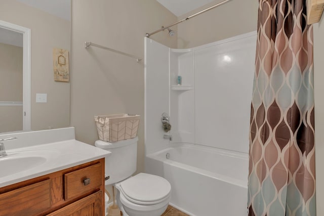 full bath with toilet, shower / bath combo, and vanity