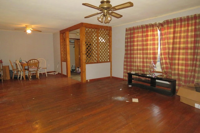 unfurnished living room featuring ceiling fan and dark wood finished floors