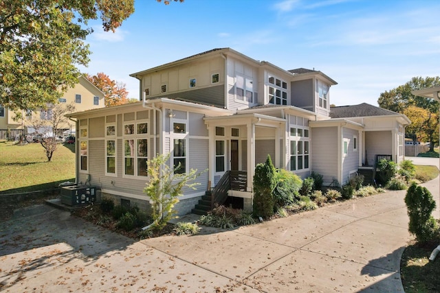 view of front of house featuring central air condition unit