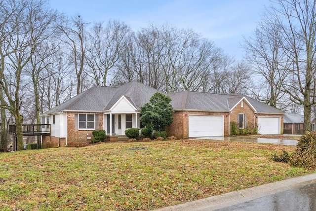 ranch-style house with crawl space, brick siding, a front lawn, and a shingled roof