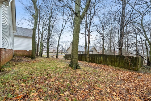 view of yard featuring fence