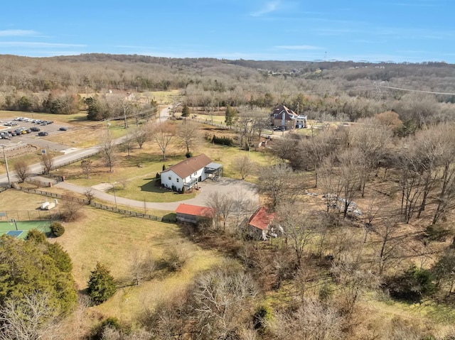 birds eye view of property with a rural view