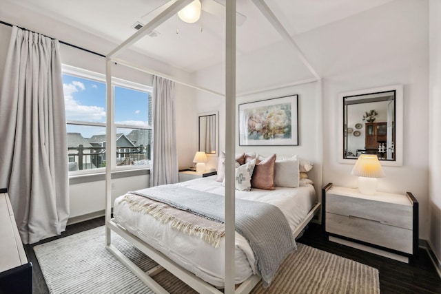 bedroom with ceiling fan and wood finished floors