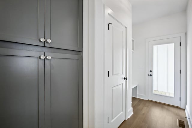 interior space featuring dark wood finished floors and visible vents