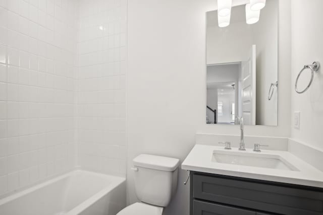 full bath with toilet, shower / bathtub combination, and vanity