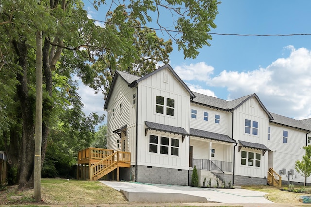 modern farmhouse featuring stairs, roof with shingles, crawl space, board and batten siding, and a patio area