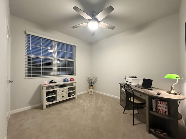 office space with ceiling fan, carpet flooring, and baseboards