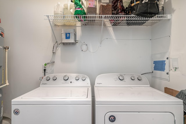 washroom featuring laundry area and washing machine and clothes dryer