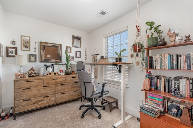 office area featuring carpet, visible vents, and baseboards