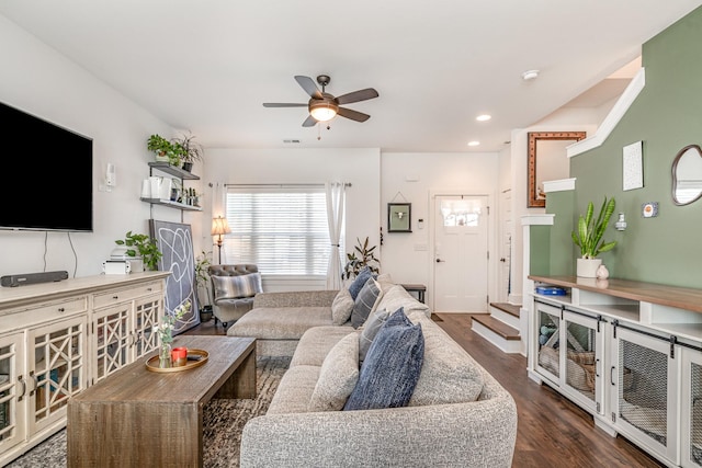 living room featuring ceiling fan, dark wood-type flooring, visible vents, and recessed lighting