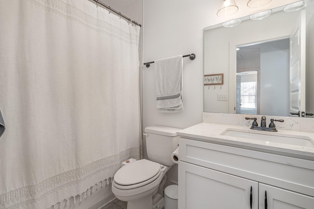 full bathroom with vanity and toilet