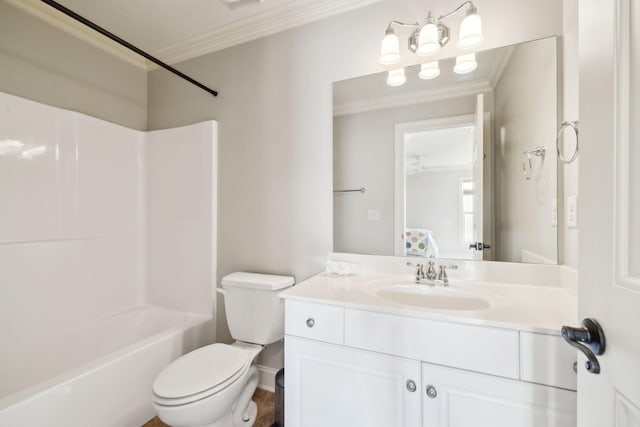 bathroom featuring toilet, washtub / shower combination, ornamental molding, and vanity