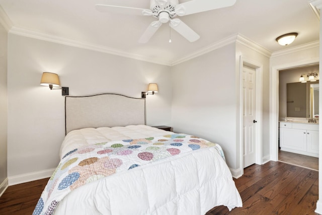 bedroom featuring ceiling fan, connected bathroom, dark wood-style flooring, baseboards, and ornamental molding