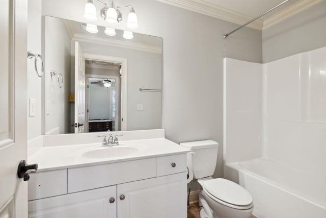 bathroom featuring toilet, ceiling fan,  shower combination, crown molding, and vanity