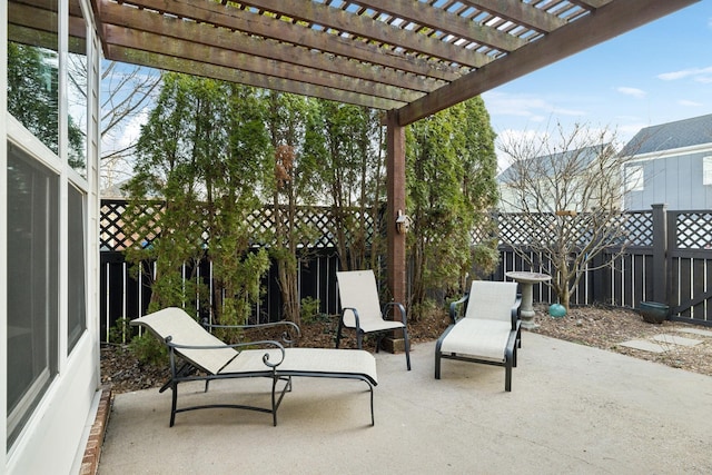 view of patio with a fenced backyard and a pergola