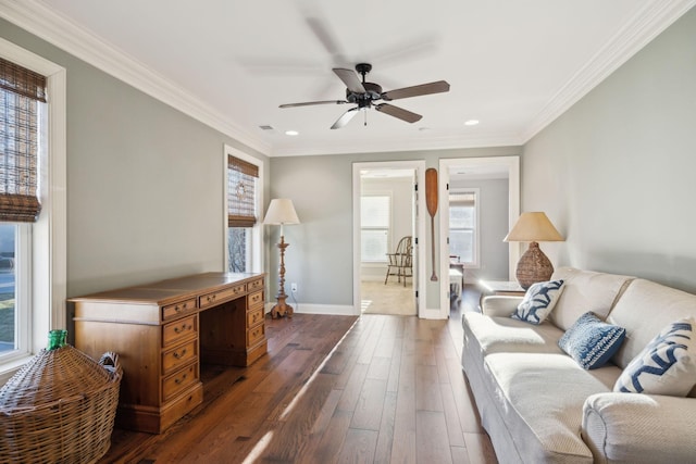 living area featuring ceiling fan, visible vents, baseboards, dark wood finished floors, and crown molding