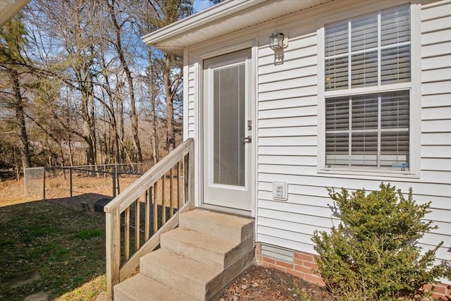 property entrance with fence