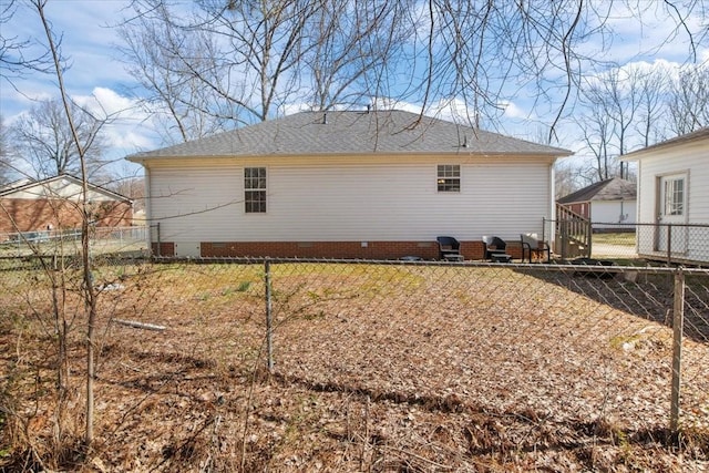 view of property exterior featuring crawl space and fence