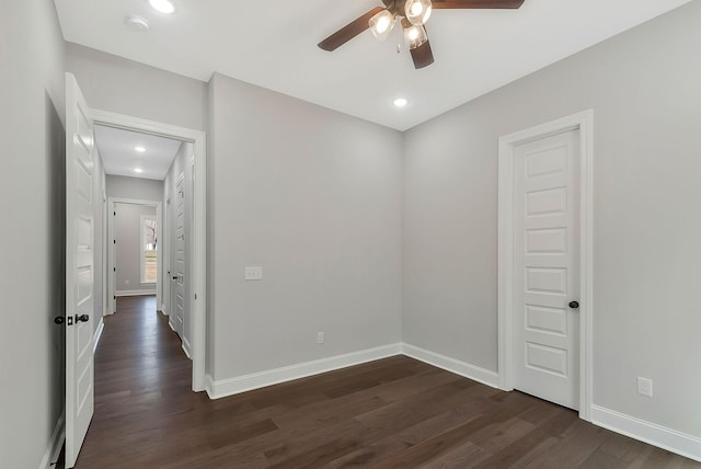 unfurnished room featuring dark wood-style floors, baseboards, a ceiling fan, and recessed lighting