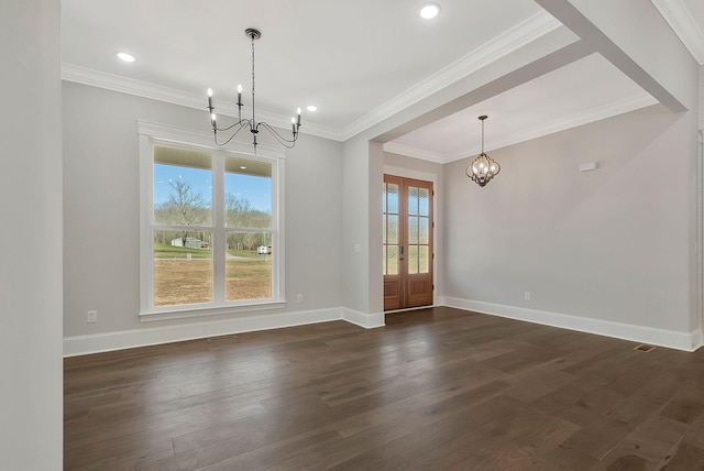 unfurnished dining area with dark wood-type flooring, ornamental molding, french doors, baseboards, and a chandelier