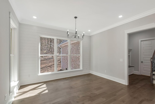 unfurnished dining area with ornamental molding, dark wood finished floors, and plenty of natural light