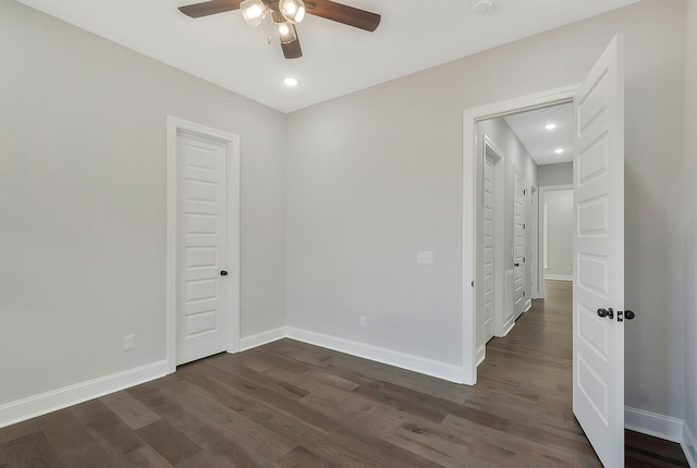 unfurnished room with ceiling fan, dark wood-type flooring, recessed lighting, and baseboards