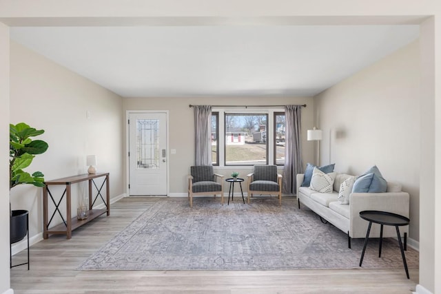 living room with wood finished floors and baseboards