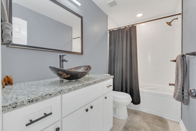 full bathroom with shower / bath combo, visible vents, toilet, tile patterned flooring, and vanity