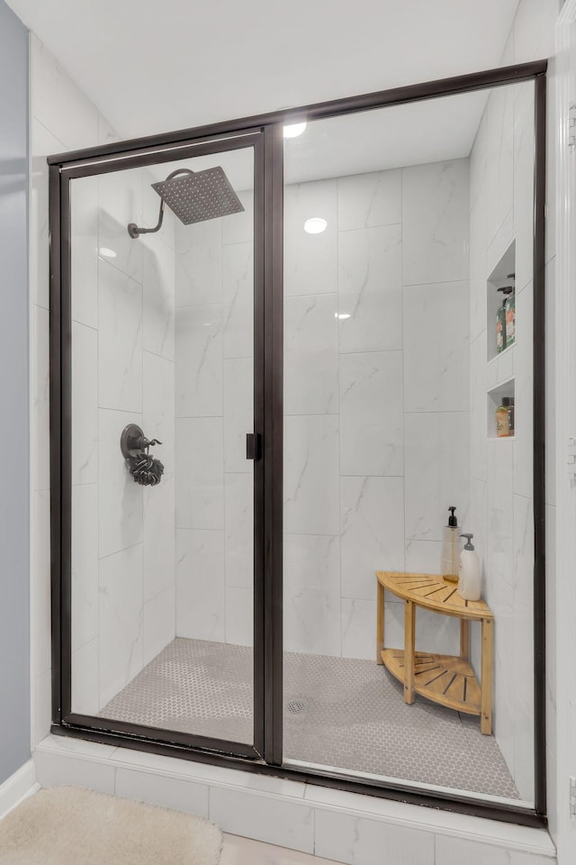 bathroom featuring a shower stall