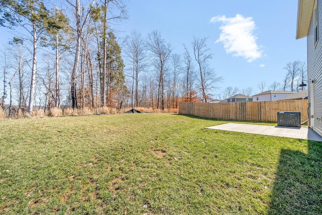 view of yard with a patio and fence