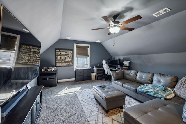 carpeted living room featuring vaulted ceiling, ceiling fan, and visible vents