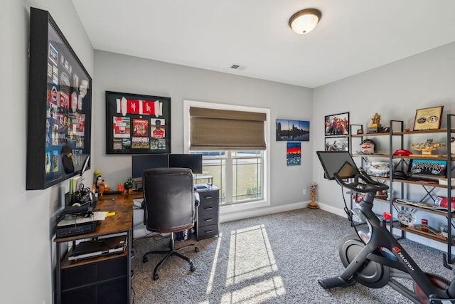 home office with carpet floors, visible vents, and baseboards