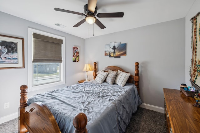 bedroom with a ceiling fan, carpet flooring, visible vents, and baseboards