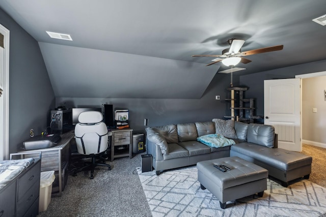 carpeted living area with vaulted ceiling, baseboards, visible vents, and a ceiling fan