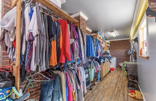 spacious closet with wood finished floors