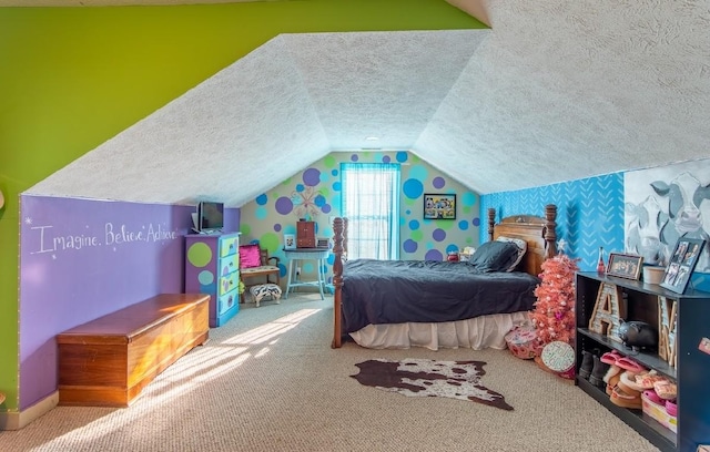 bedroom featuring carpet floors, vaulted ceiling, and a textured ceiling