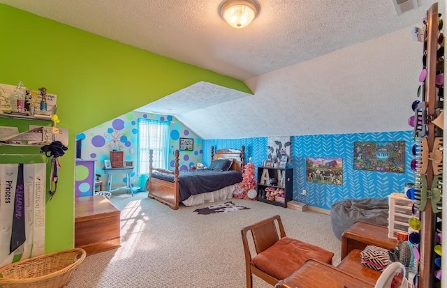 carpeted bedroom featuring vaulted ceiling, a textured ceiling, visible vents, and wallpapered walls