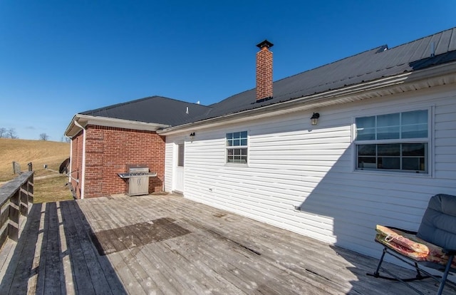 deck featuring grilling area