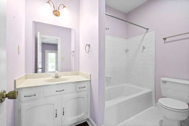 full bathroom featuring toilet, shower / bathtub combination, and vanity