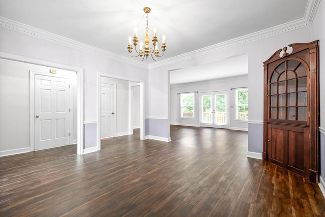 interior space with ornamental molding, dark wood-style flooring, baseboards, and an inviting chandelier