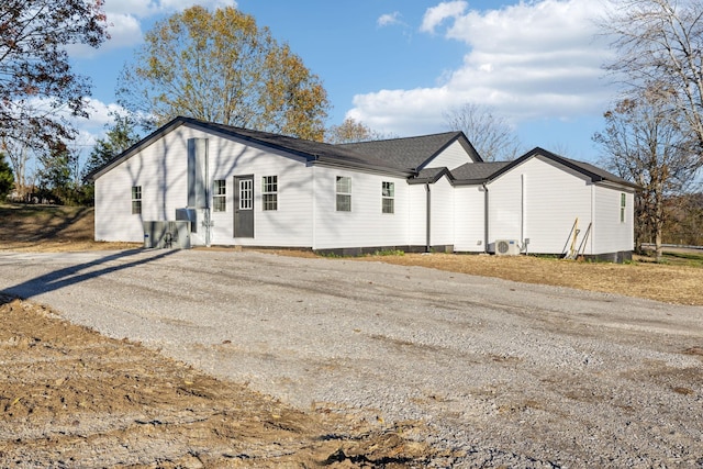 view of home's exterior with driveway