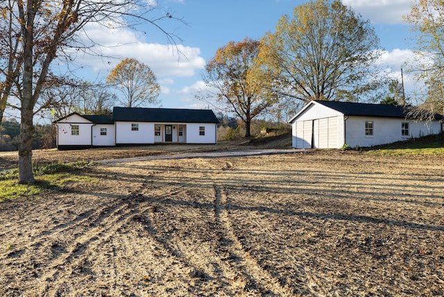 exterior space with an outbuilding