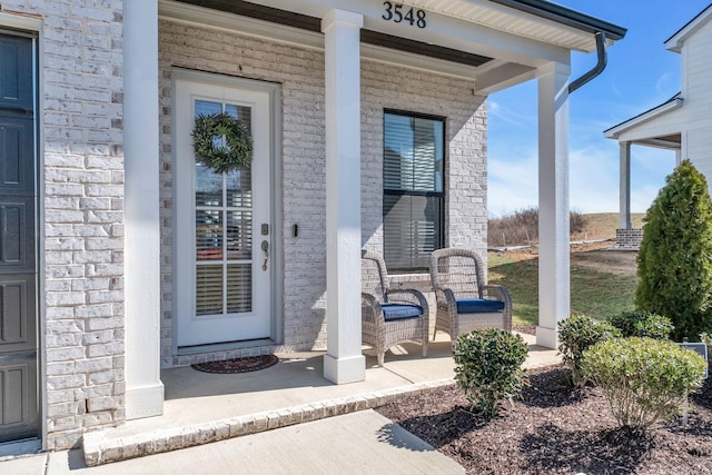 doorway to property featuring a porch