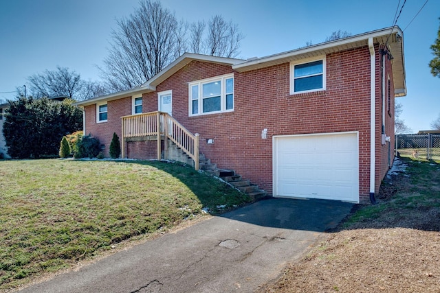 ranch-style house featuring an attached garage, driveway, and brick siding