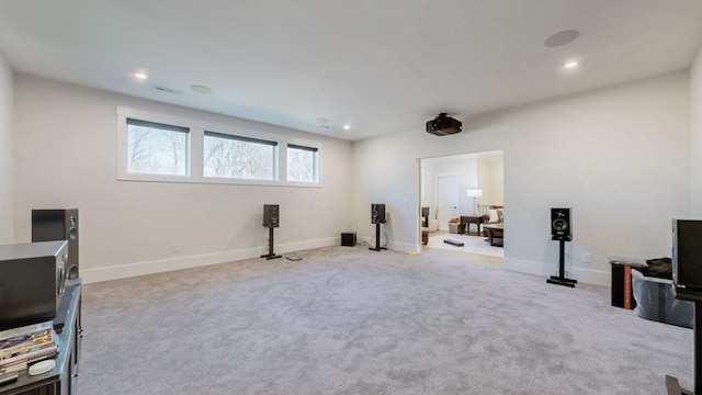 interior space featuring recessed lighting, carpet, visible vents, and baseboards